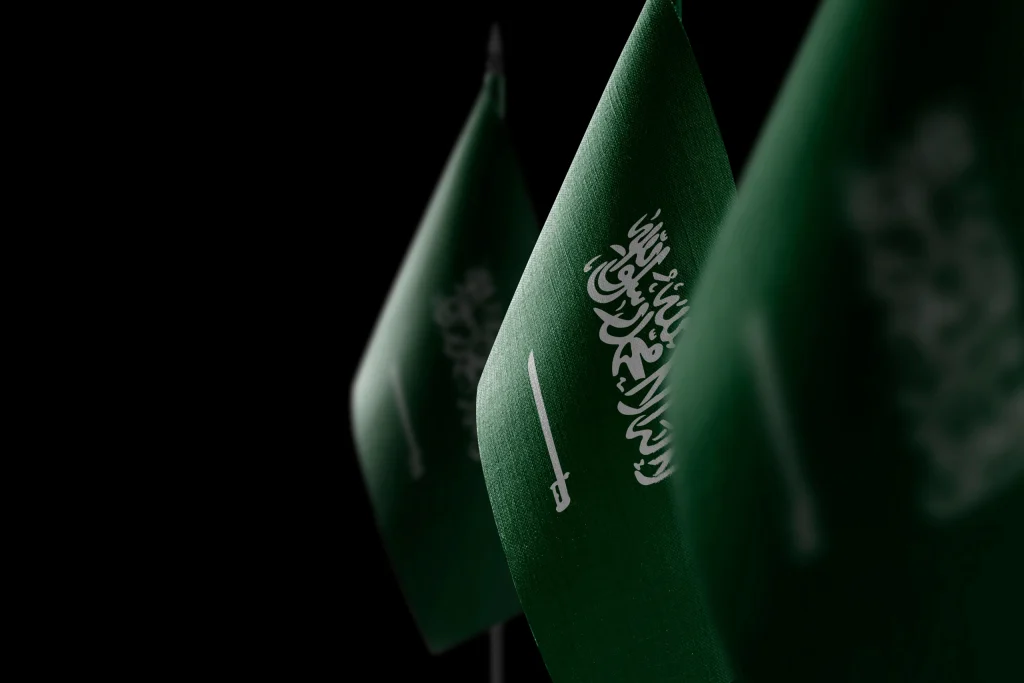 Flags of Saudi Arabia, the market analysed in BKN301's tokenisation outlook to 2030